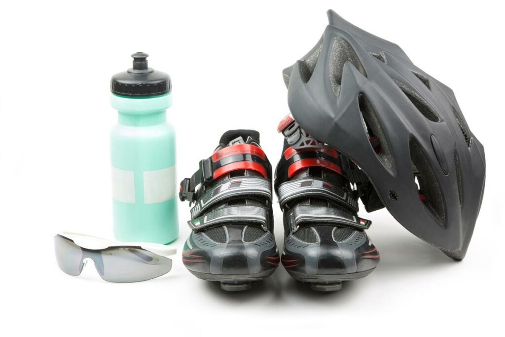 helmet, clipless shoes, water bottle and sunglasses